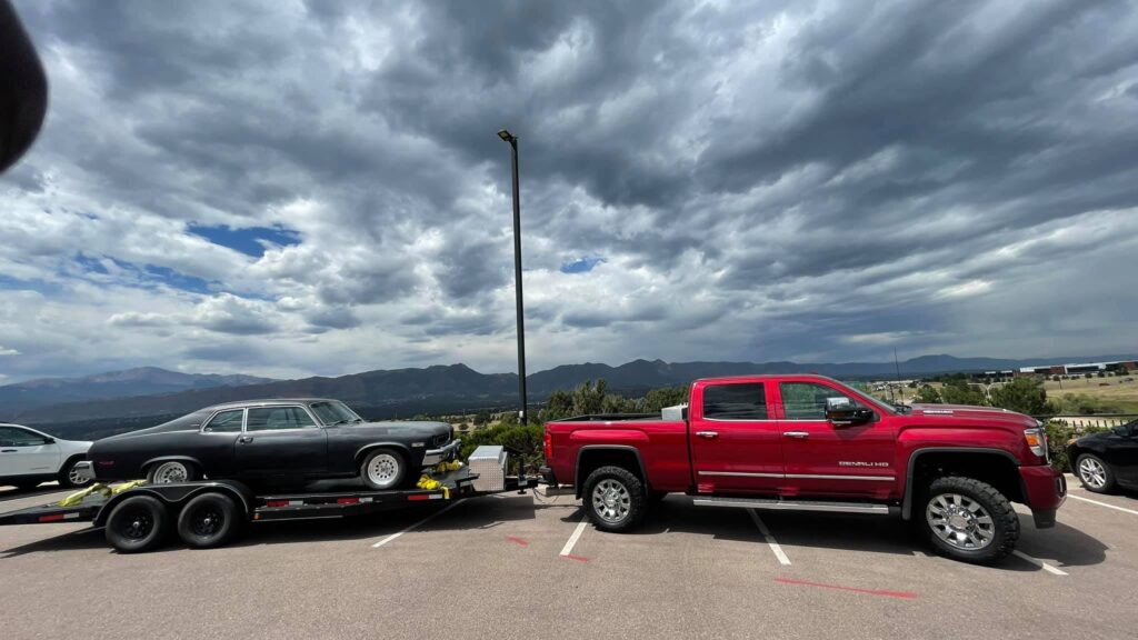 truck-hauling-a-car-bumper-pull